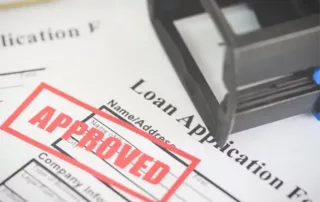 Loan application with approved stamp