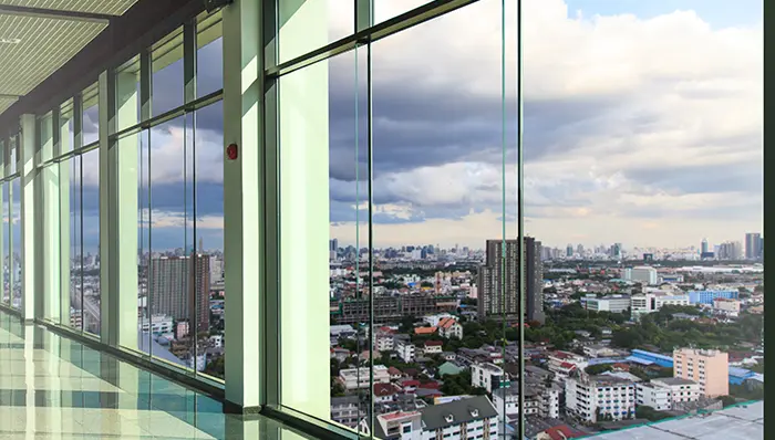 Commercial building windows overlooking city
